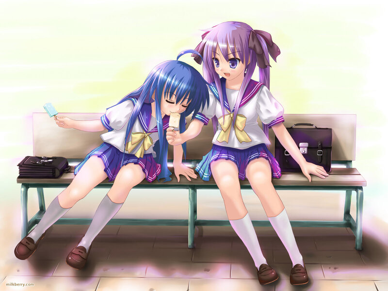 Two girls sharing ice cream