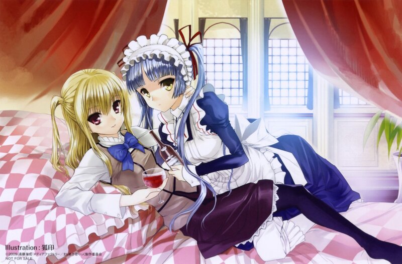 Two girls sharing wine in bed