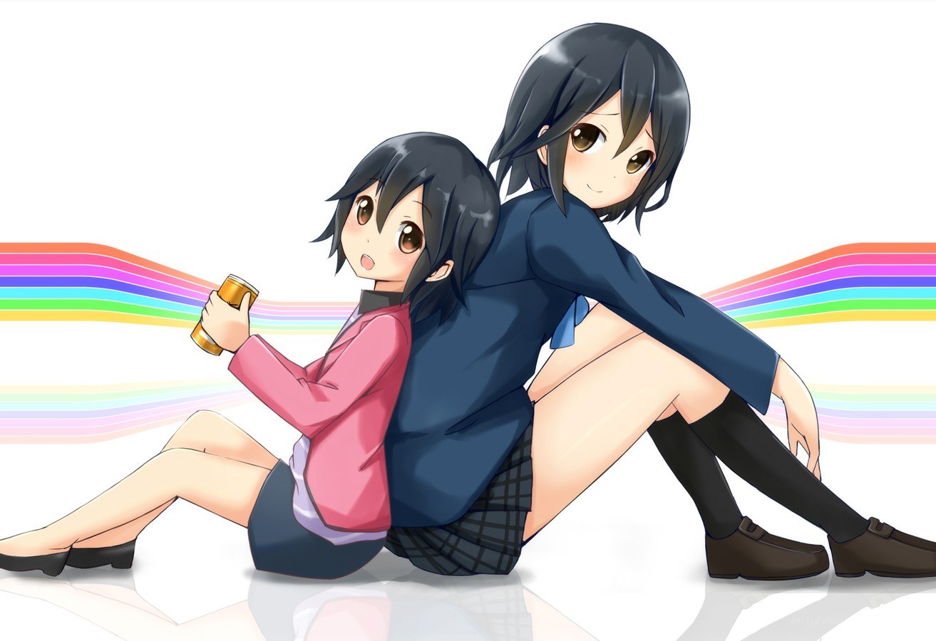 Two girls sitting back to back