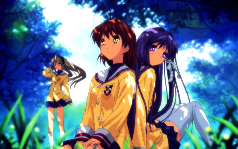 Two Girls Sitting in Grass