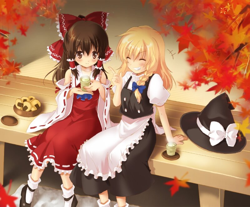 Two Girls Sitting on Bench
