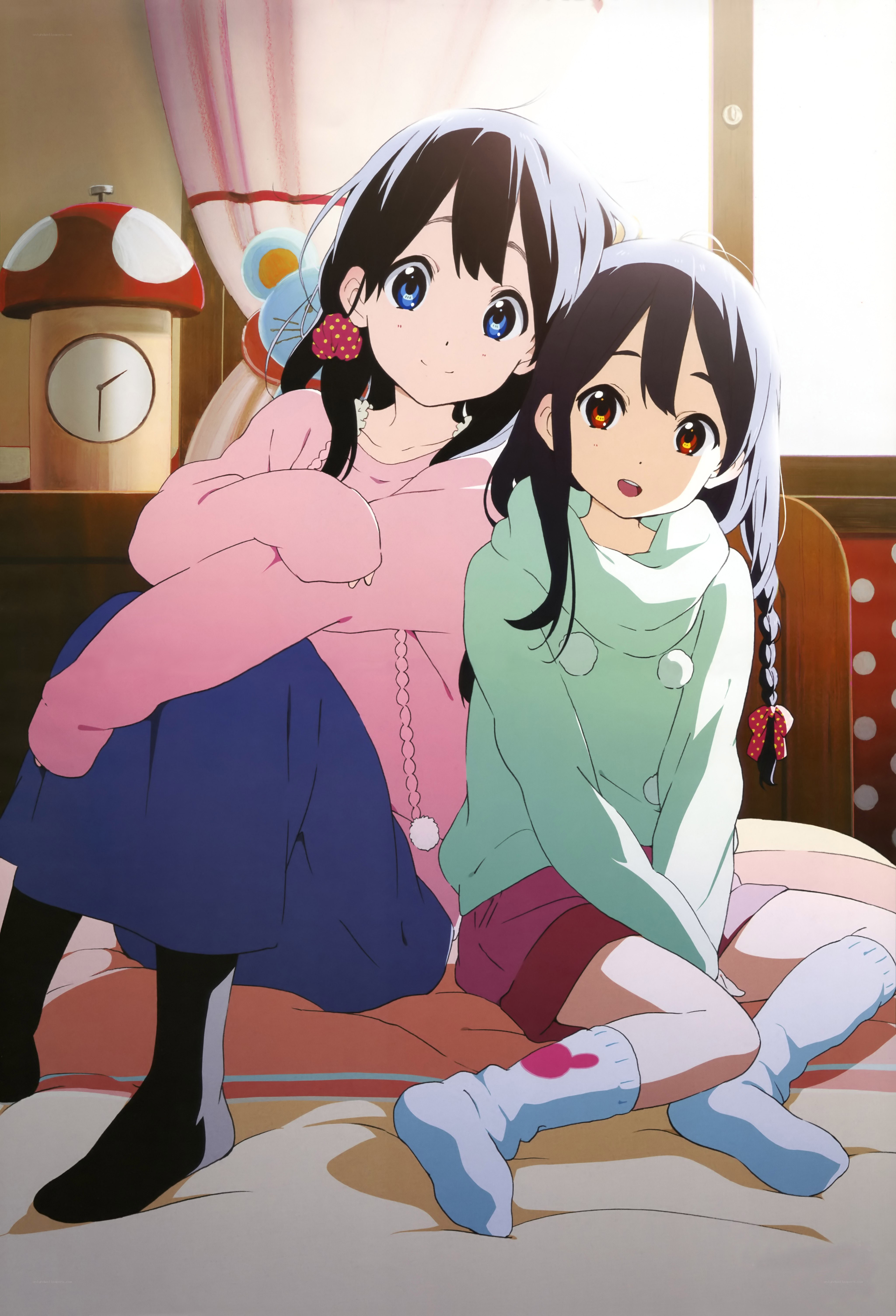 Two girls sitting together