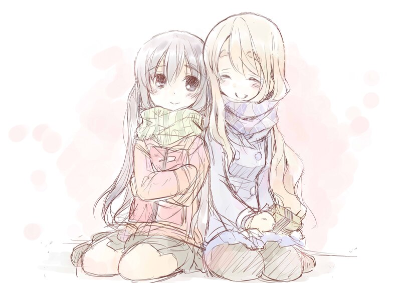 Two girls sitting together