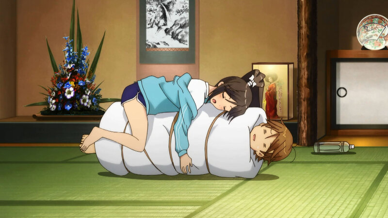 Two Girls Sleeping on Futon