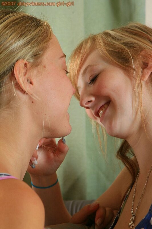 two girls smiling together