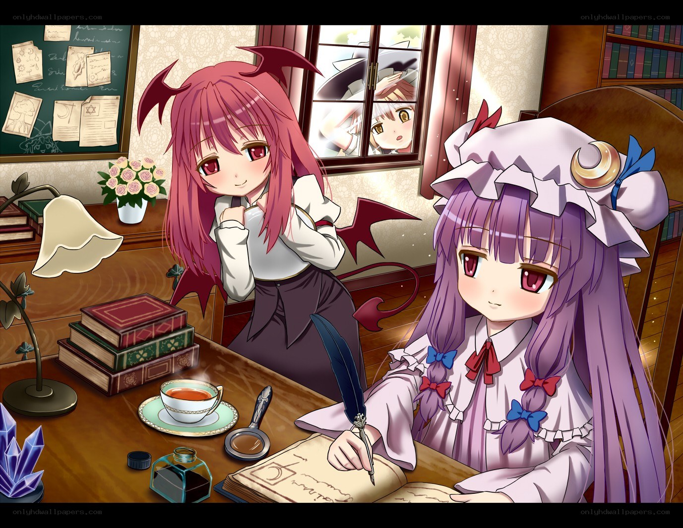 Two girls studying at a desk
