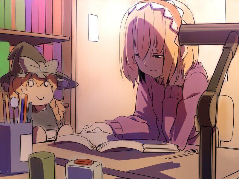 Two girls studying at a desk