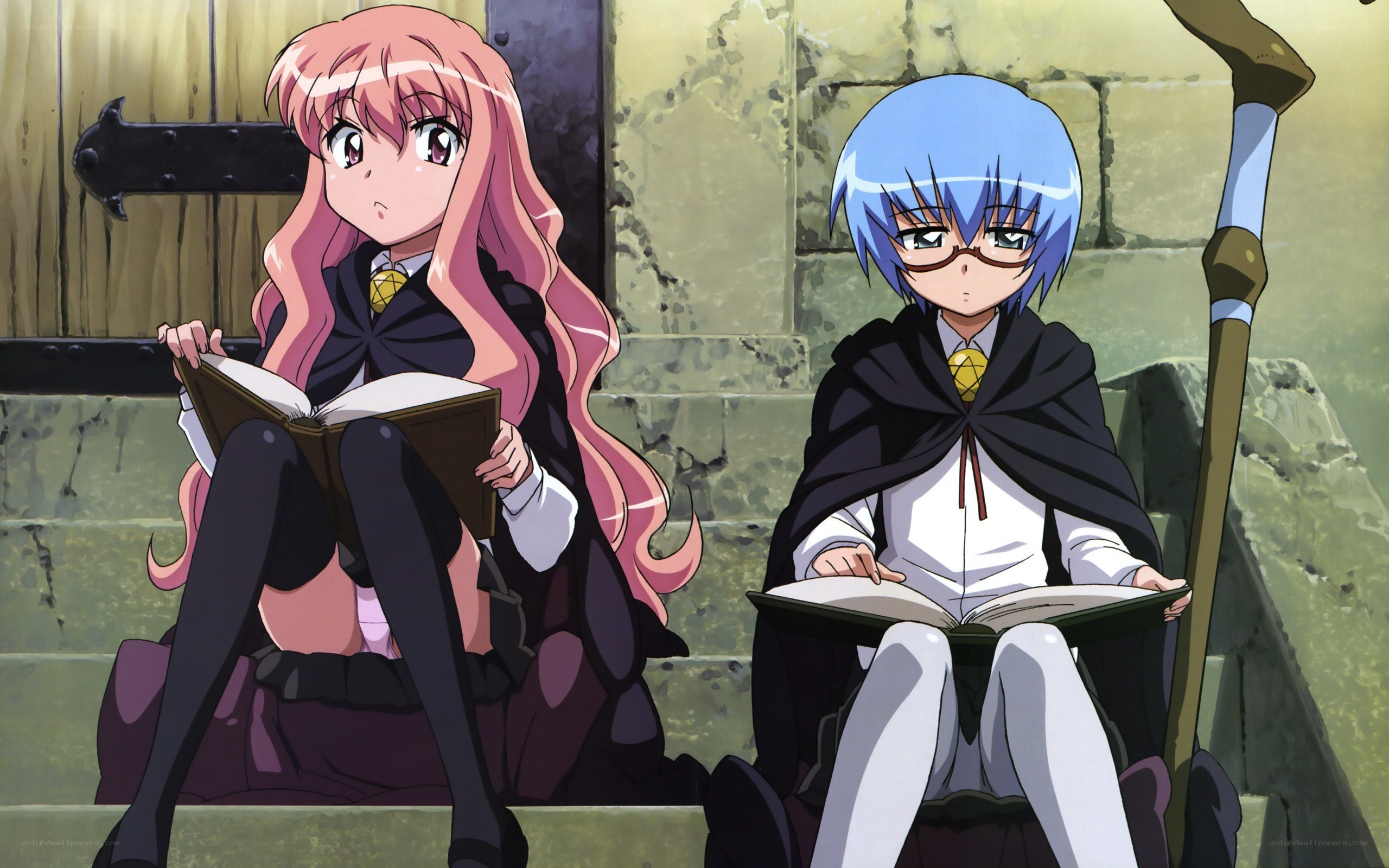 Two girls studying in a castle