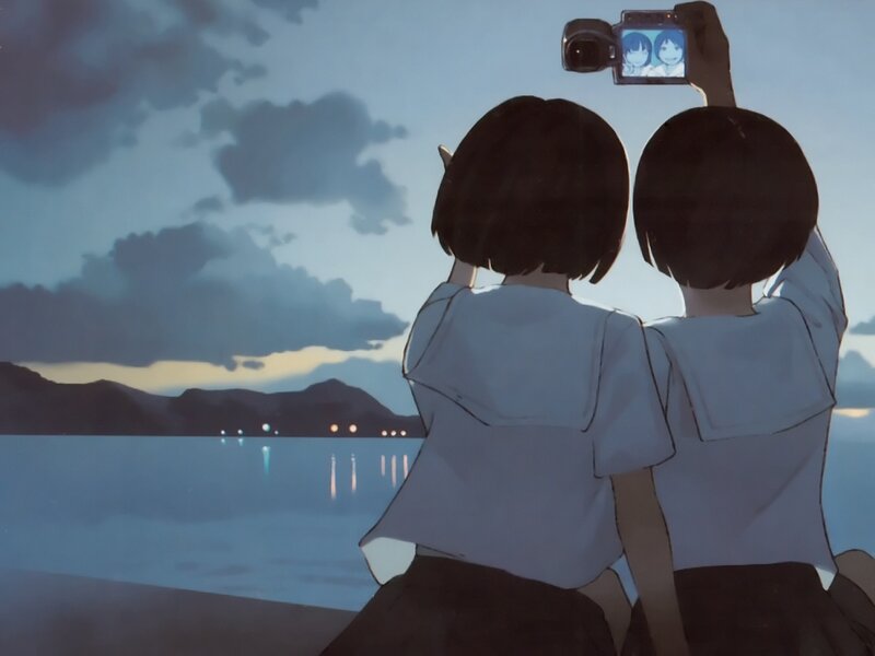 Two Girls Taking a Photo