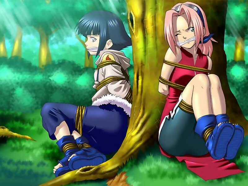 Two girls tied to a tree
