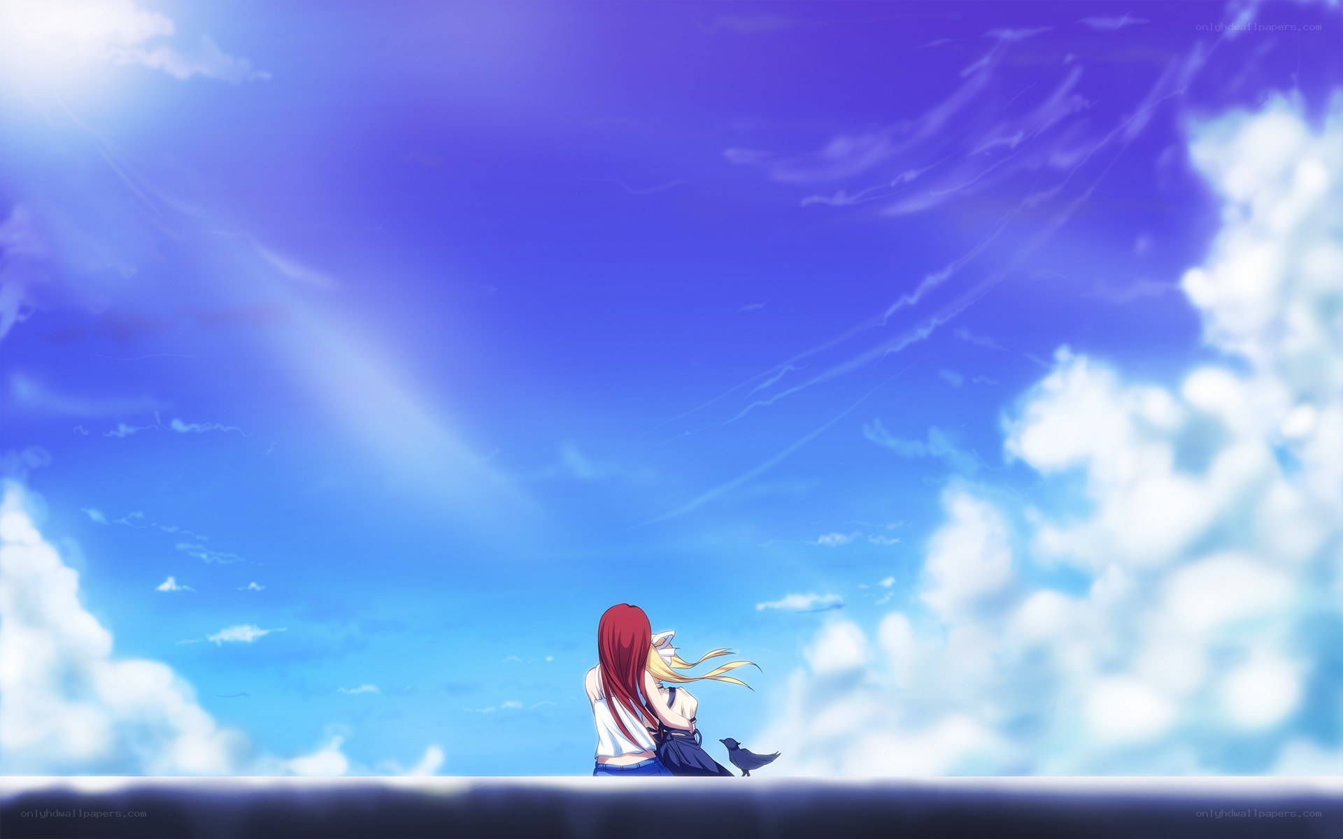 two girls under a blue sky