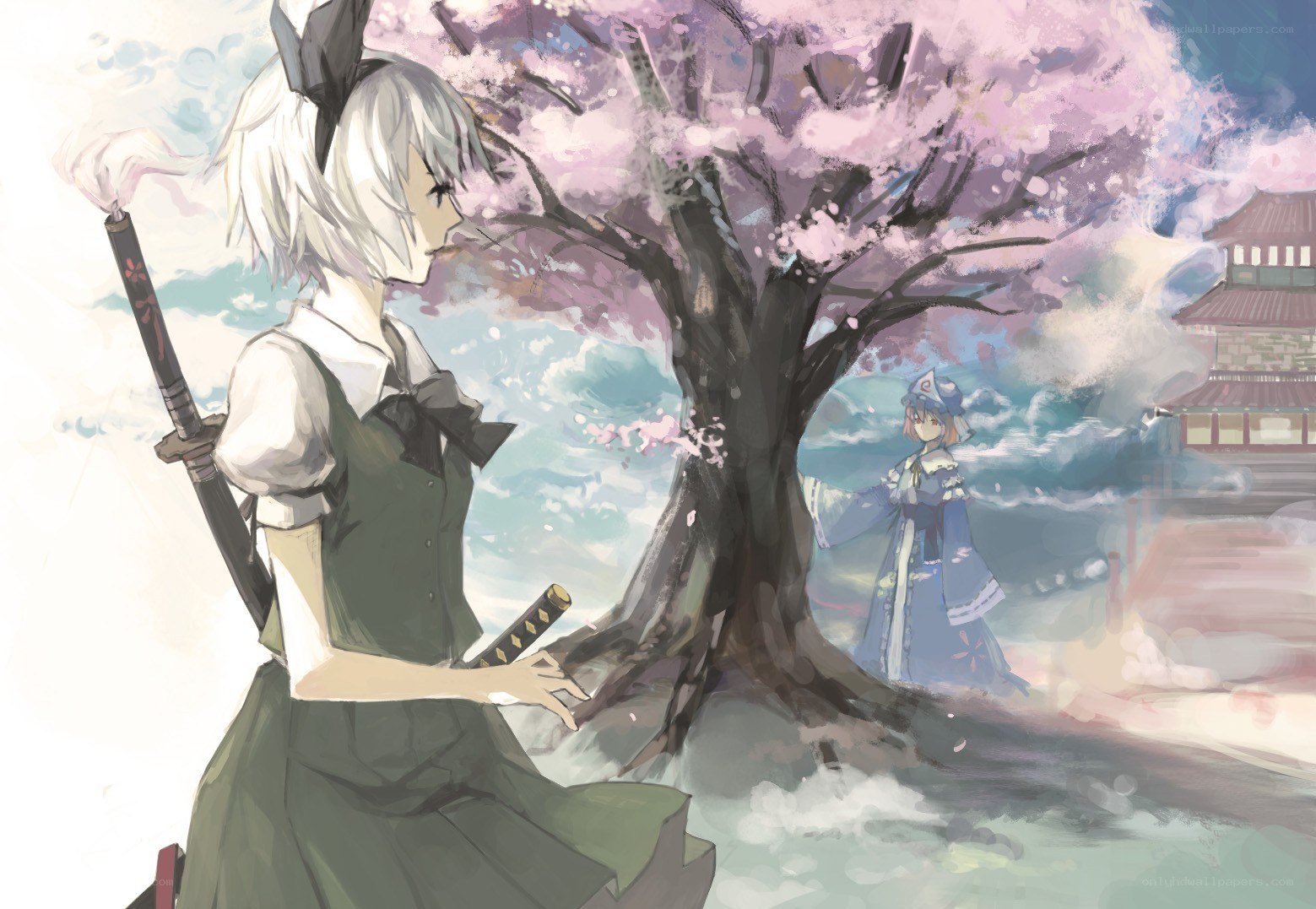 Two girls under a cherry blossom tree