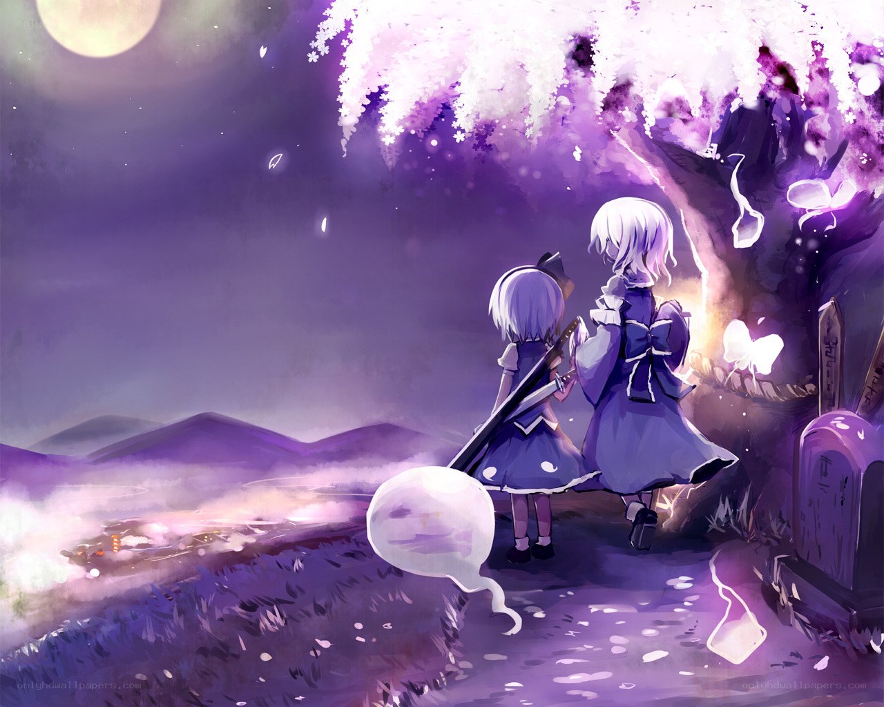 Two girls under a cherry blossom tree