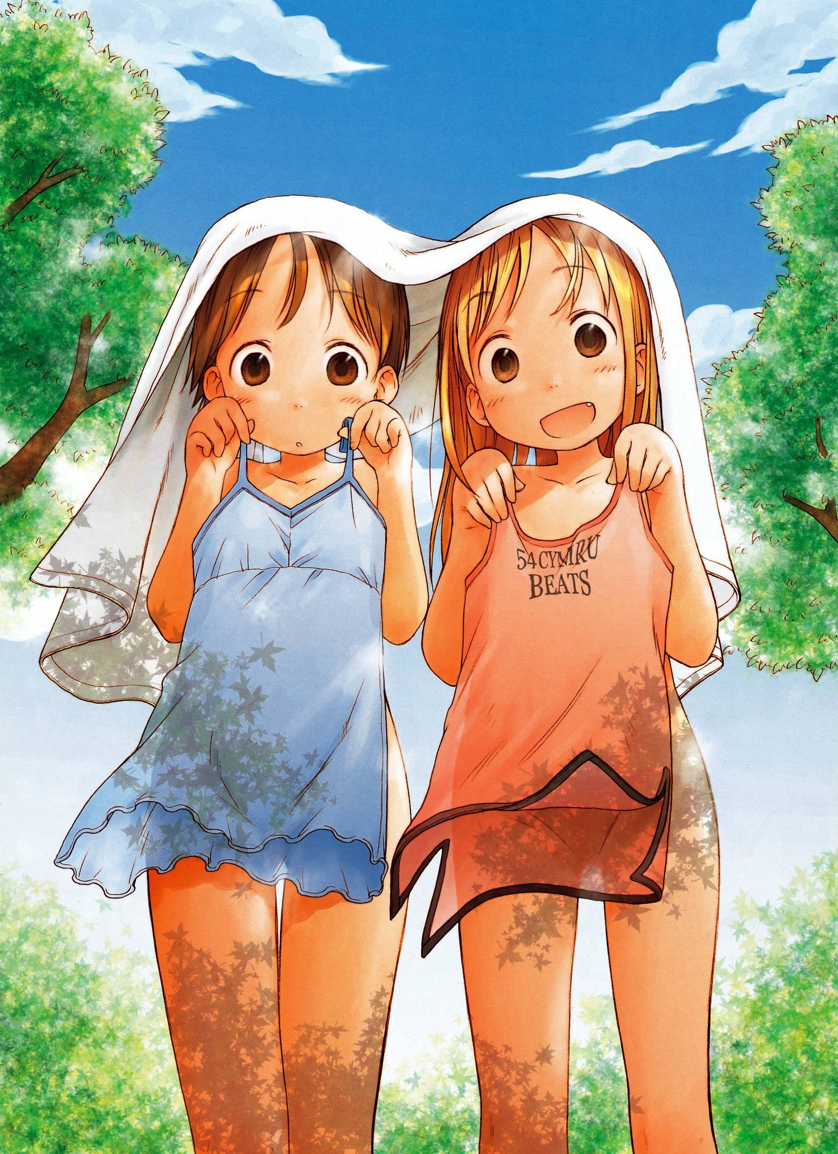 Two girls under a cloth