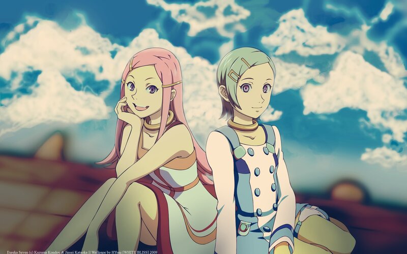 Two girls under a cloudy sky