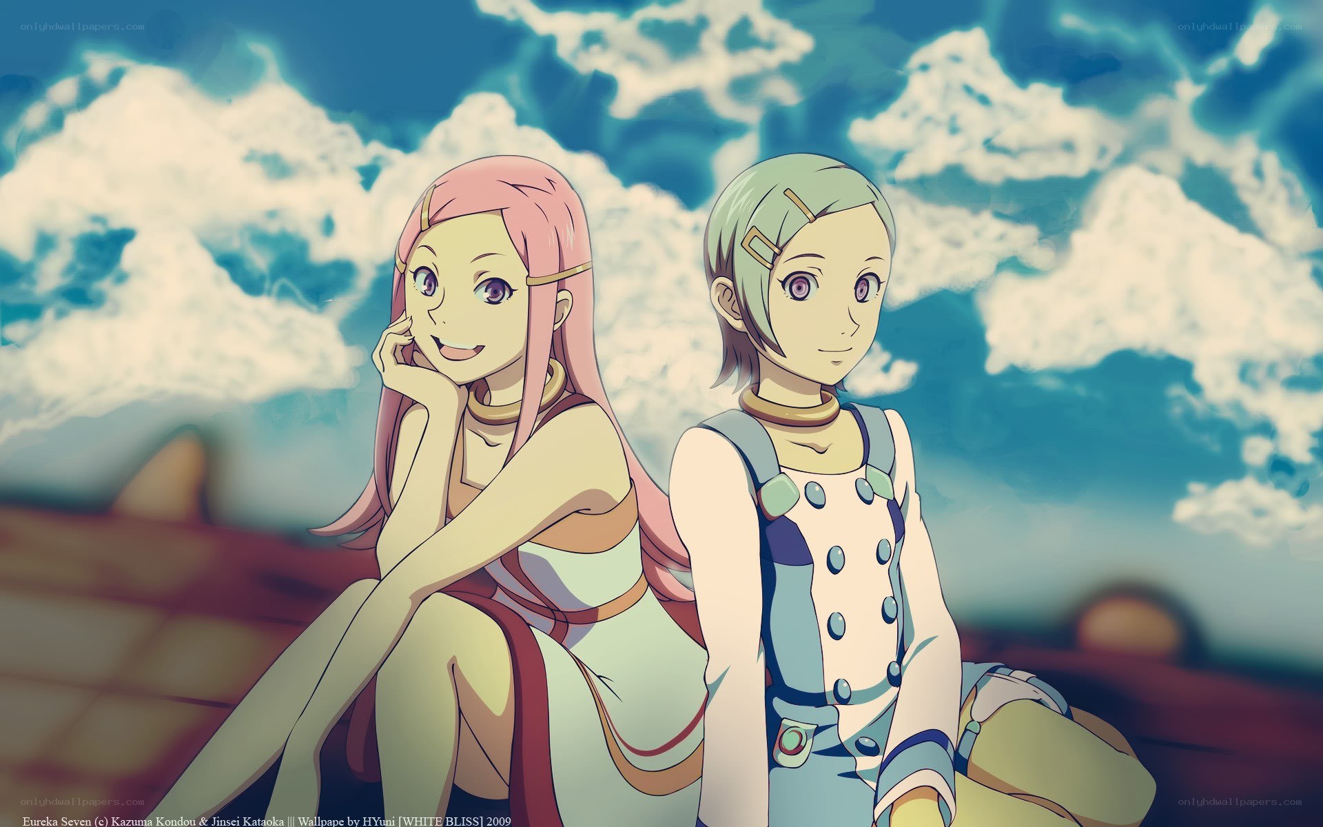 Two girls under a cloudy sky