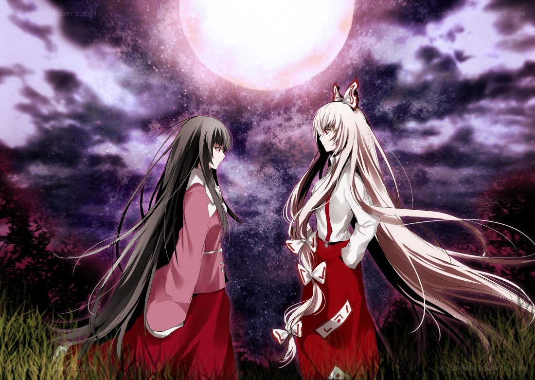 Two girls under a full moon