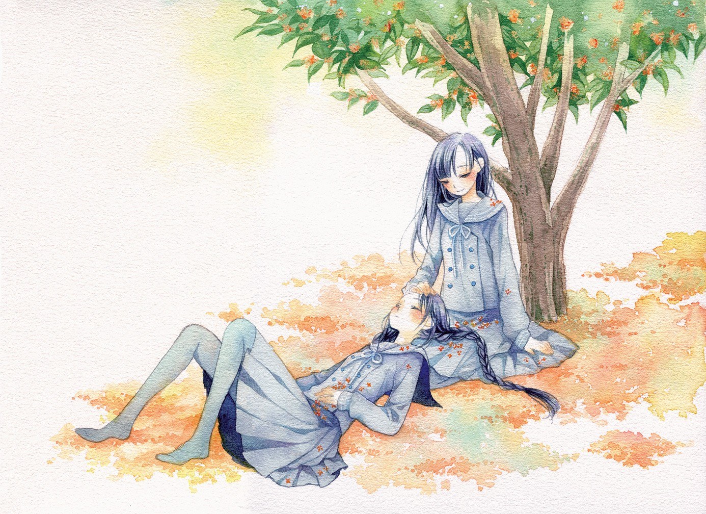 Two girls under a tree