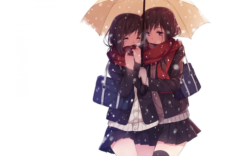 two girls under an umbrella