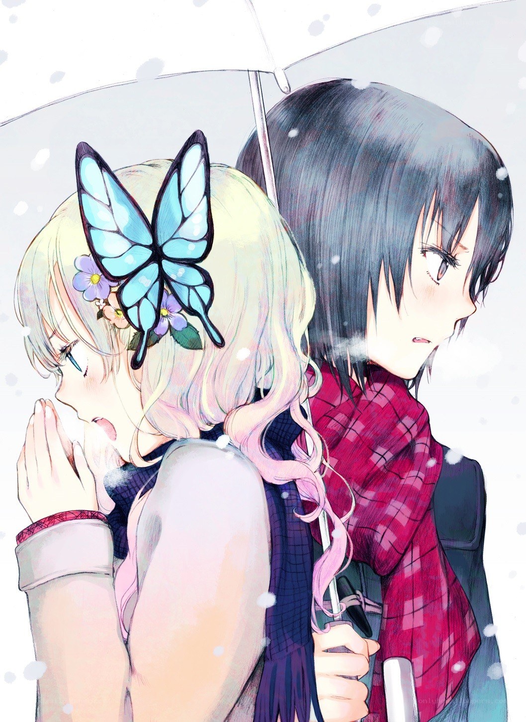 Two girls under an umbrella