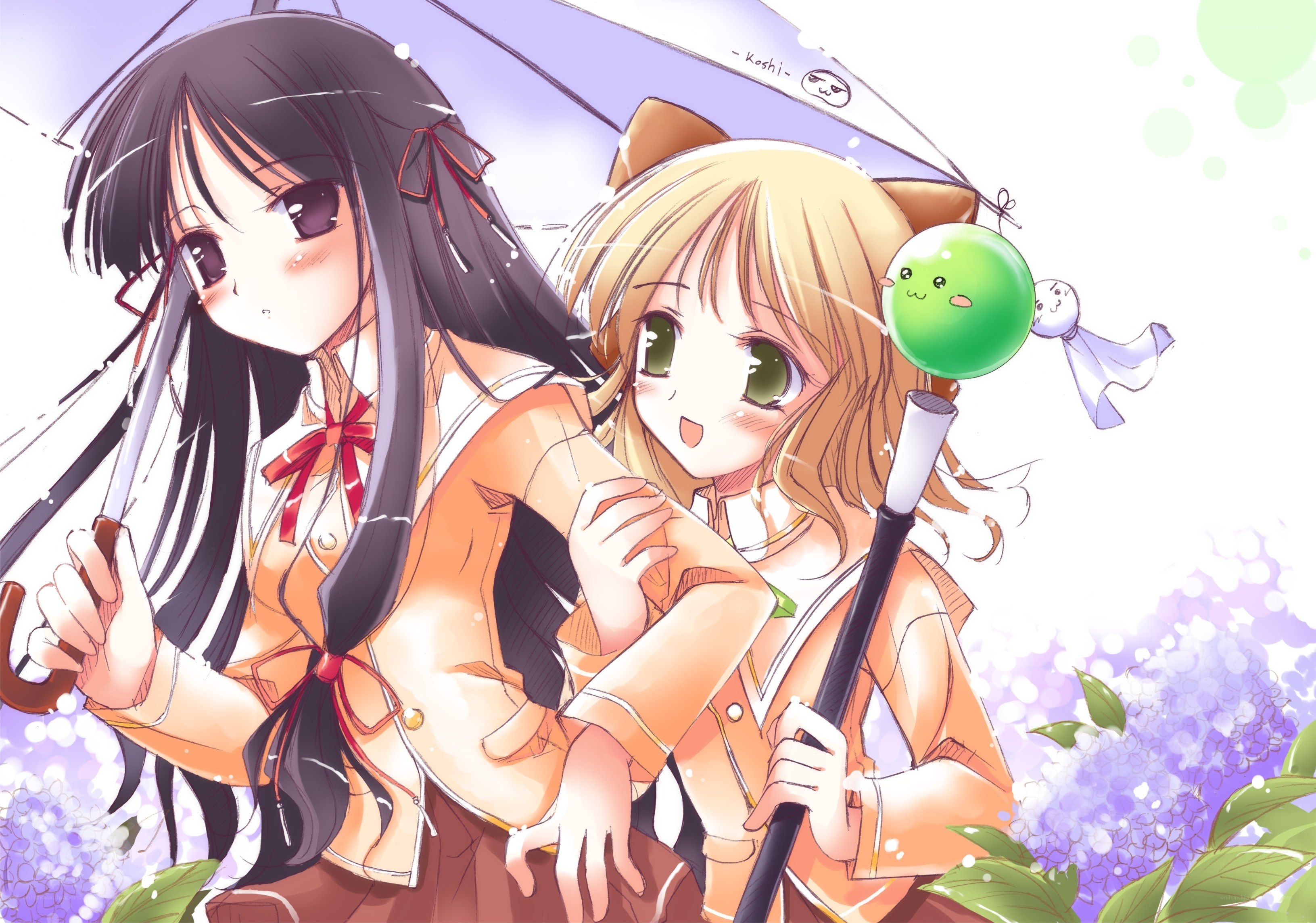 Two girls under an umbrella