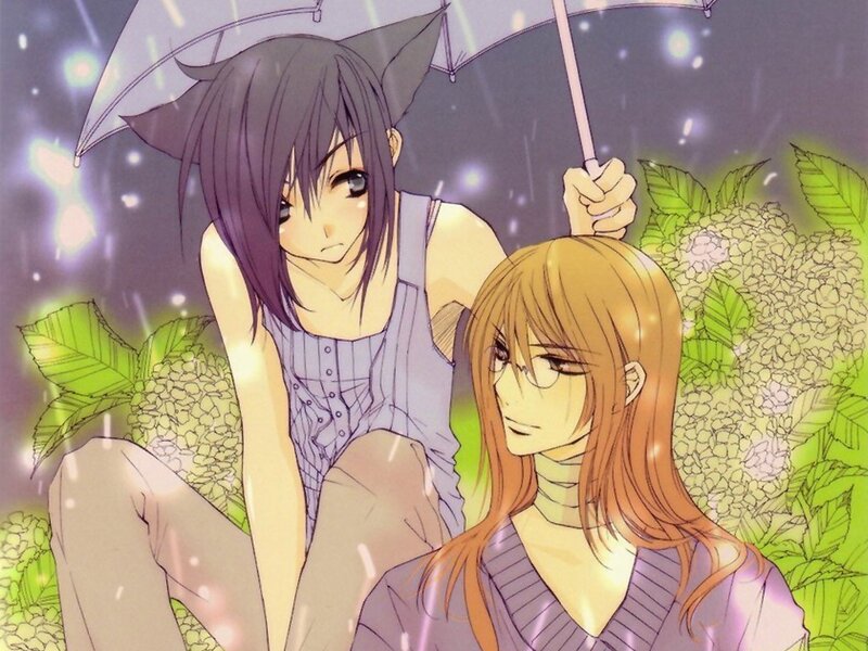 Two girls under an umbrella in the rain