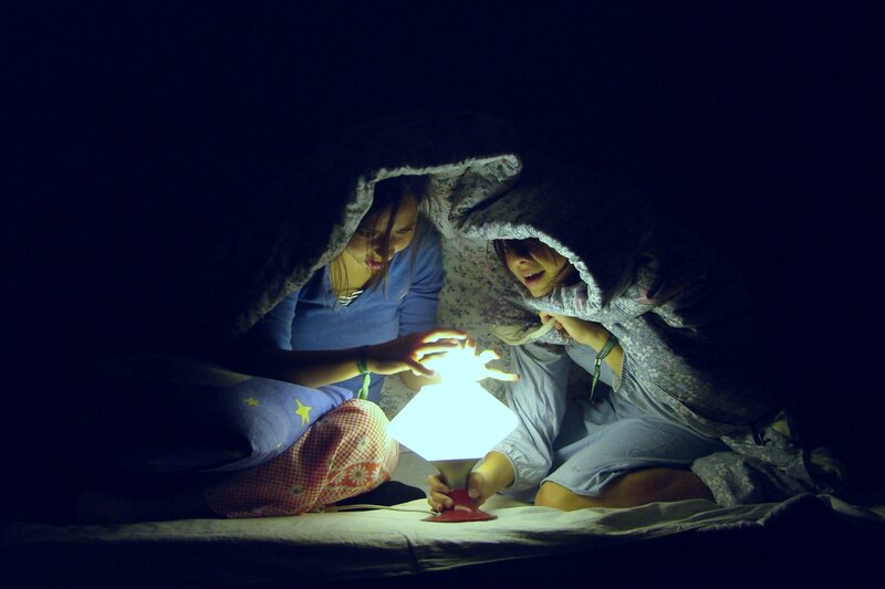 Two Girls under Blanket