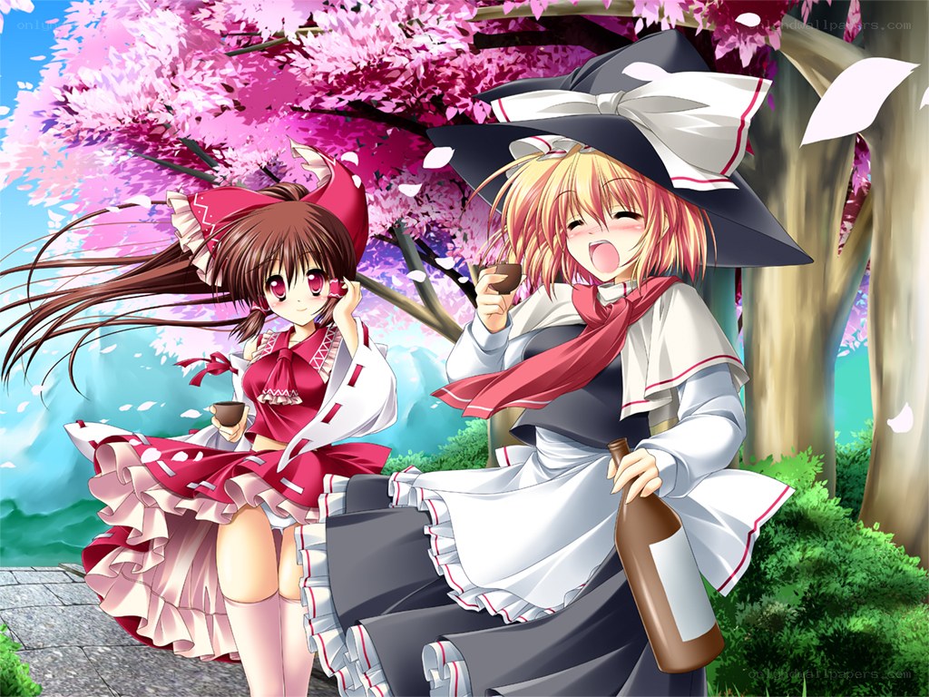 Two girls under cherry blossoms