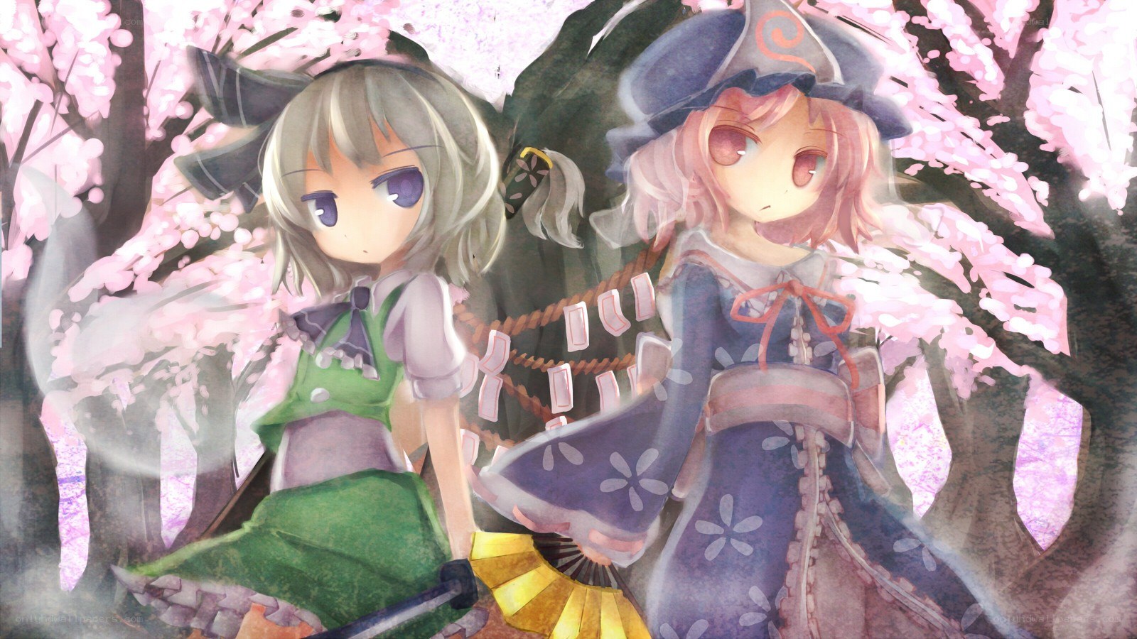 Two girls under cherry blossoms
