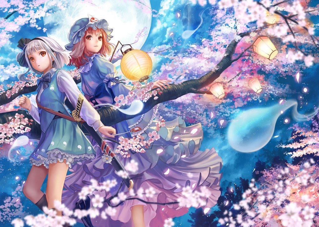 Two girls under cherry blossoms