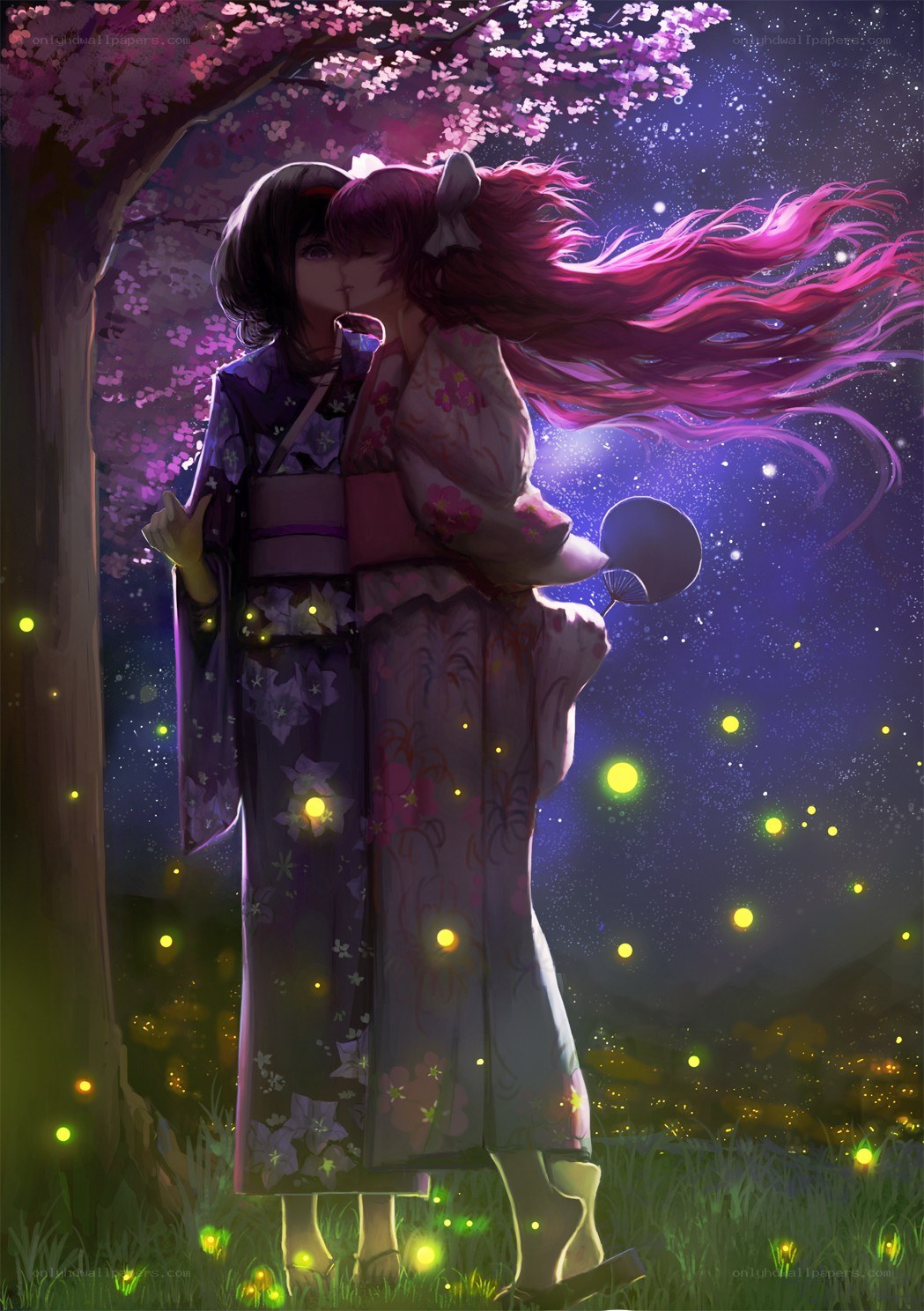 Two girls under cherry blossoms