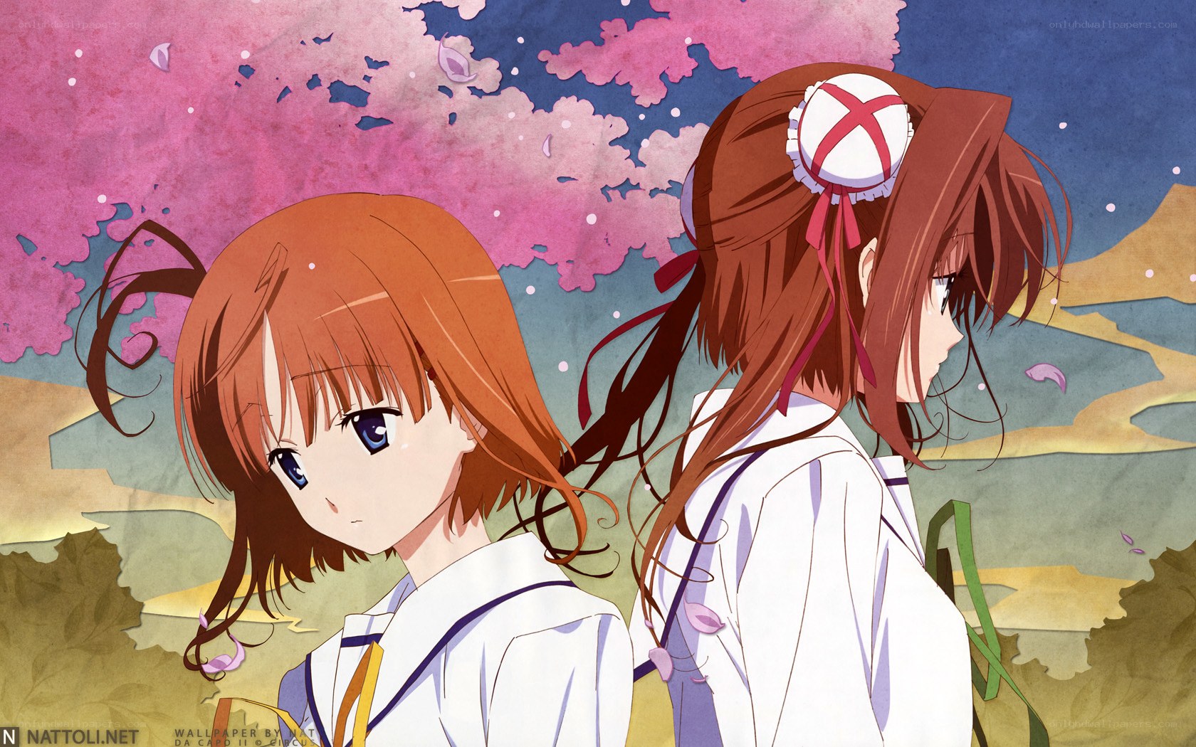 Two girls under cherry blossoms