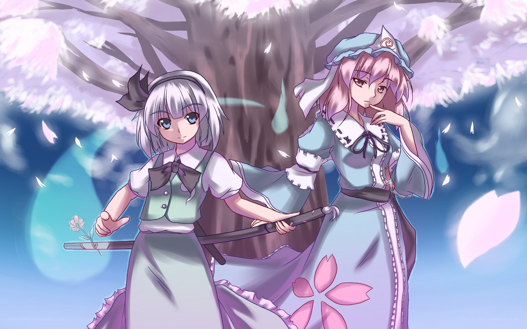 two girls under cherry blossoms