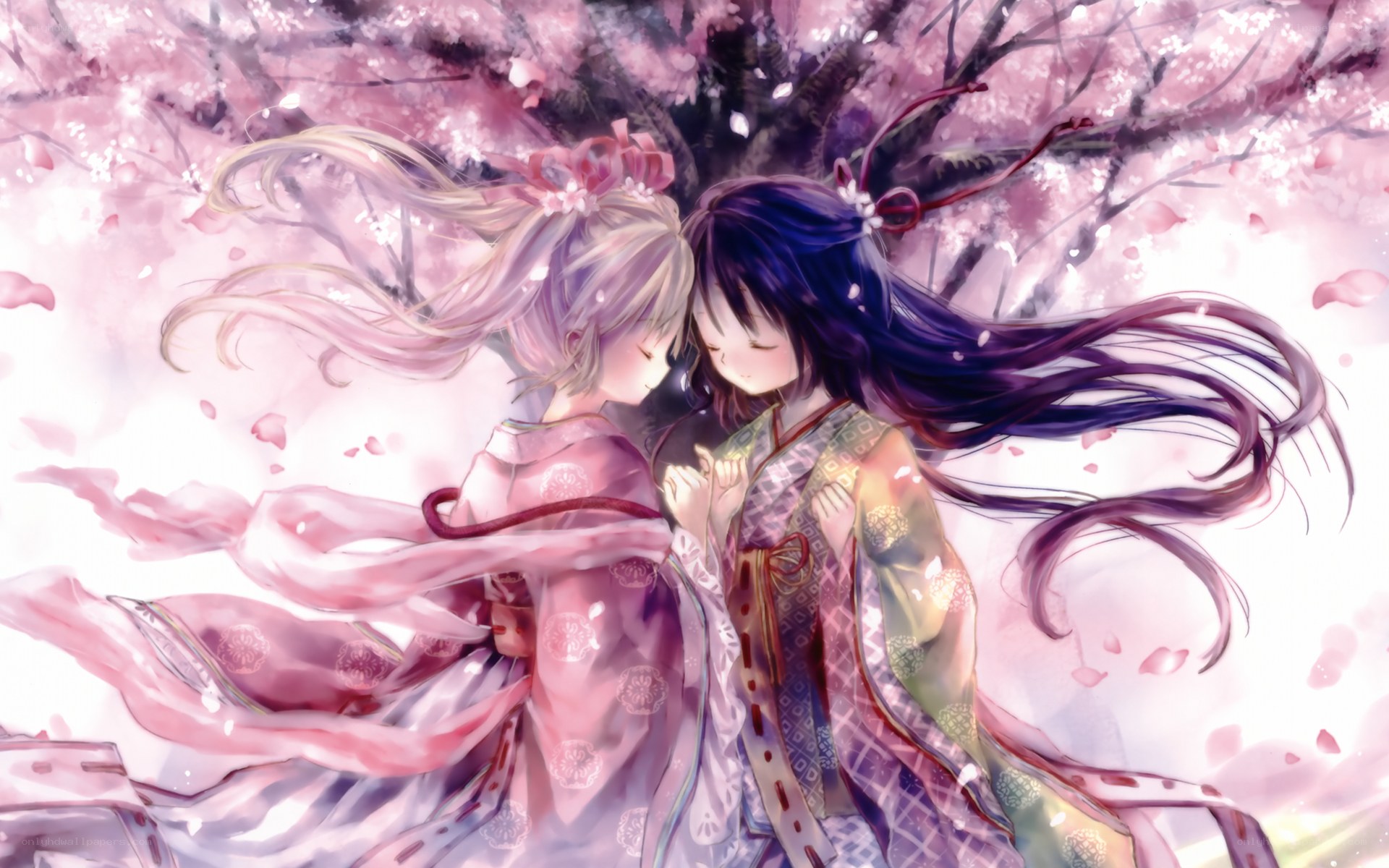 Two girls under cherry blossoms