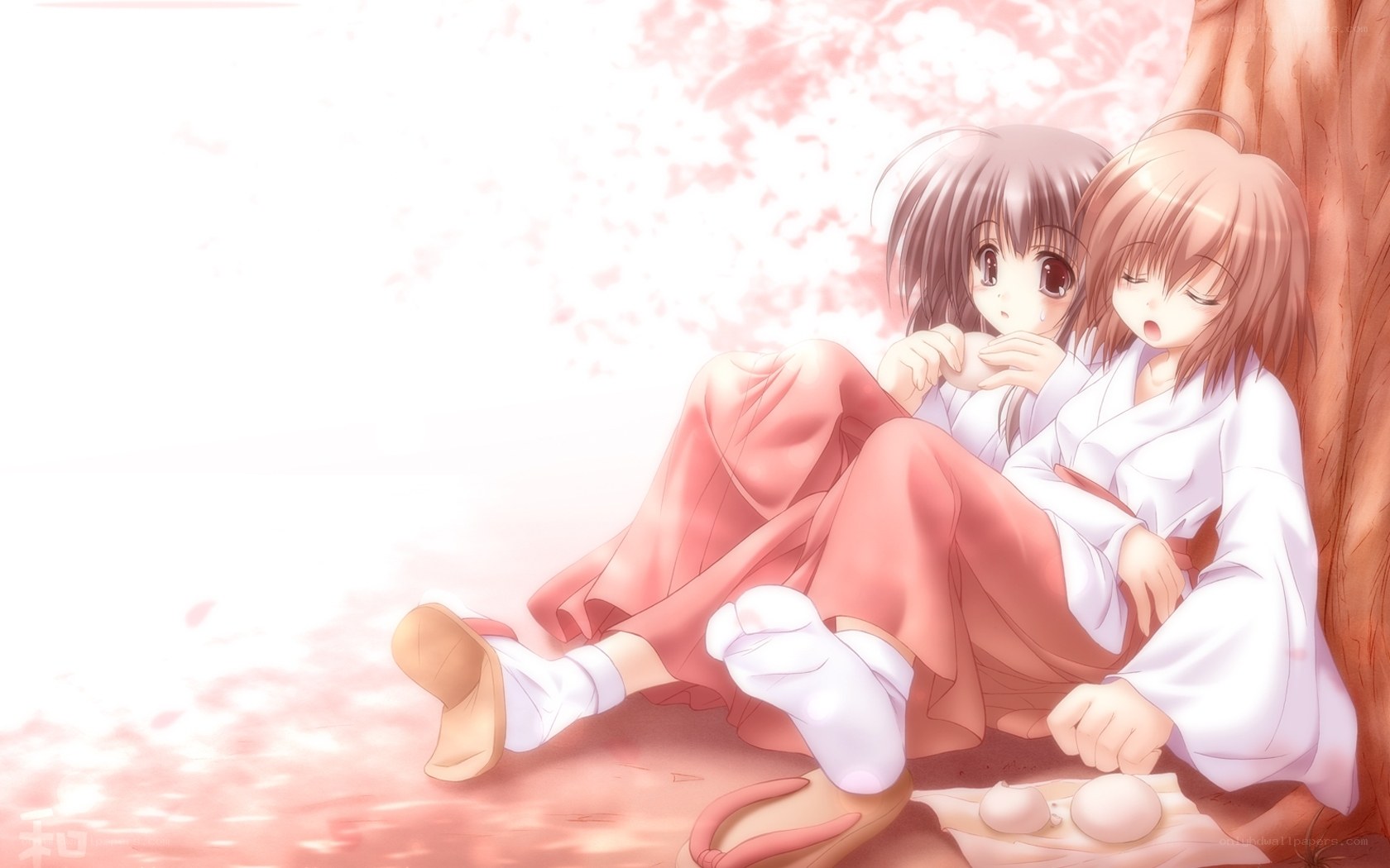 Two girls under cherry blossoms