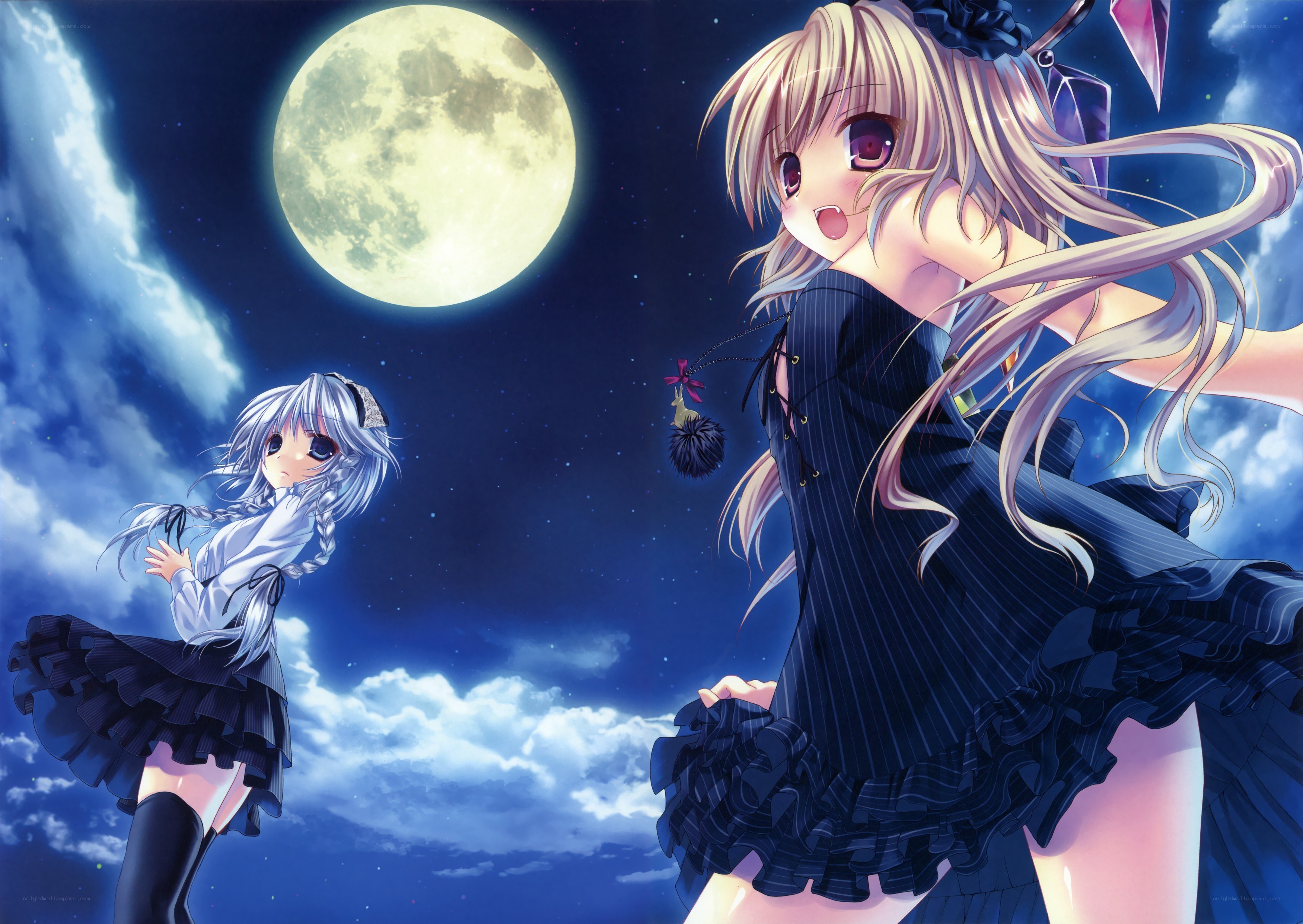 Two girls under the moon
