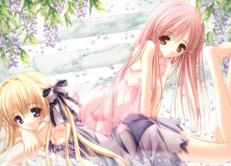 Two girls under wisteria flowers