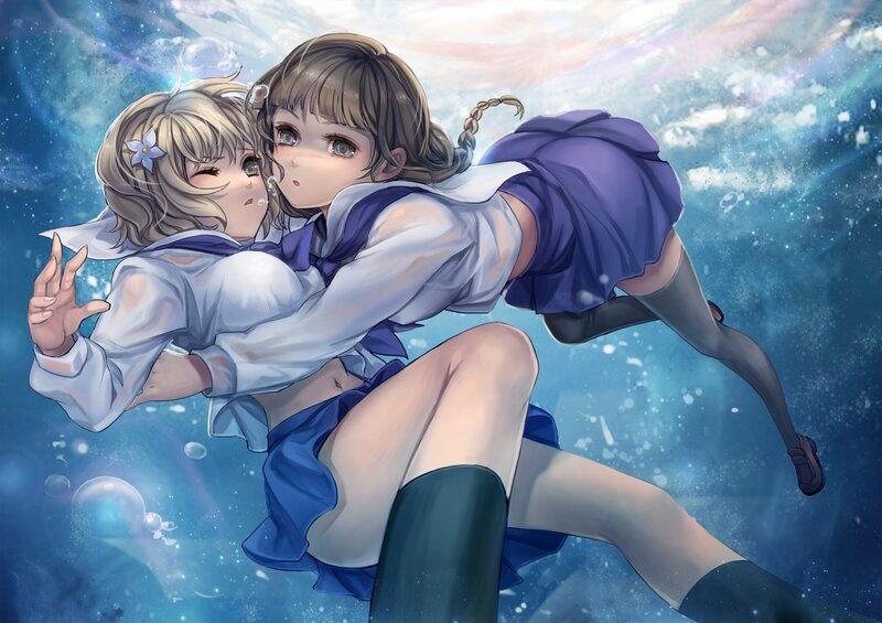 Two girls underwater in school uniforms