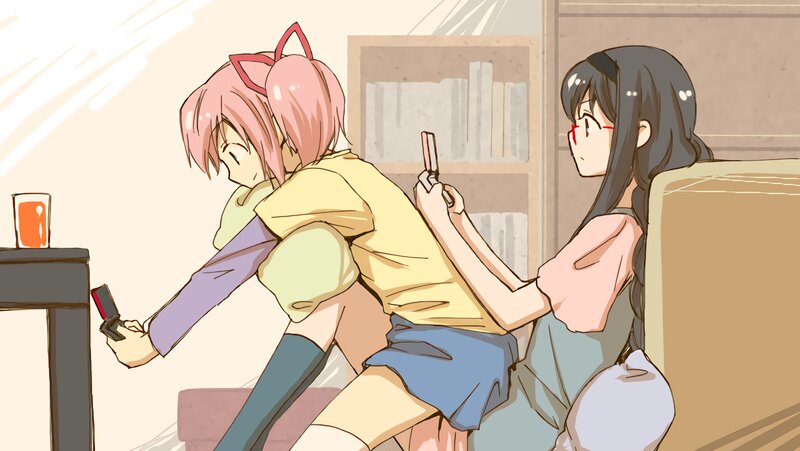 Two Girls Using Phones