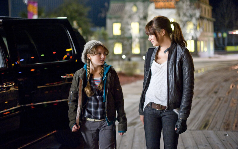 two girls walking at night