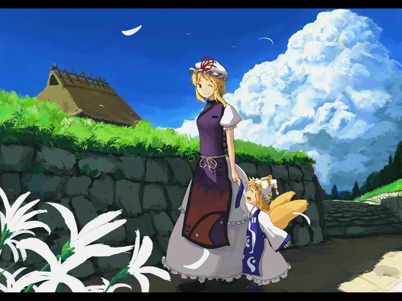 Two girls walking in a village