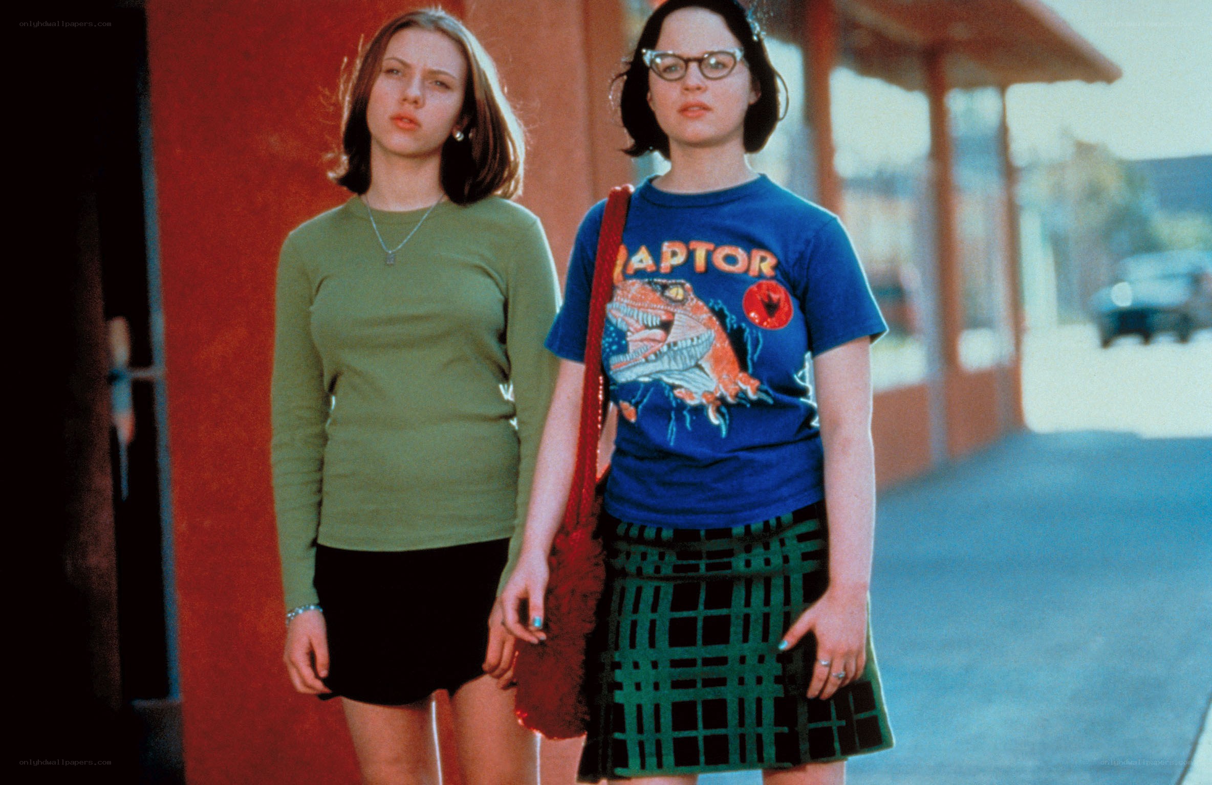 Two girls walking on a street