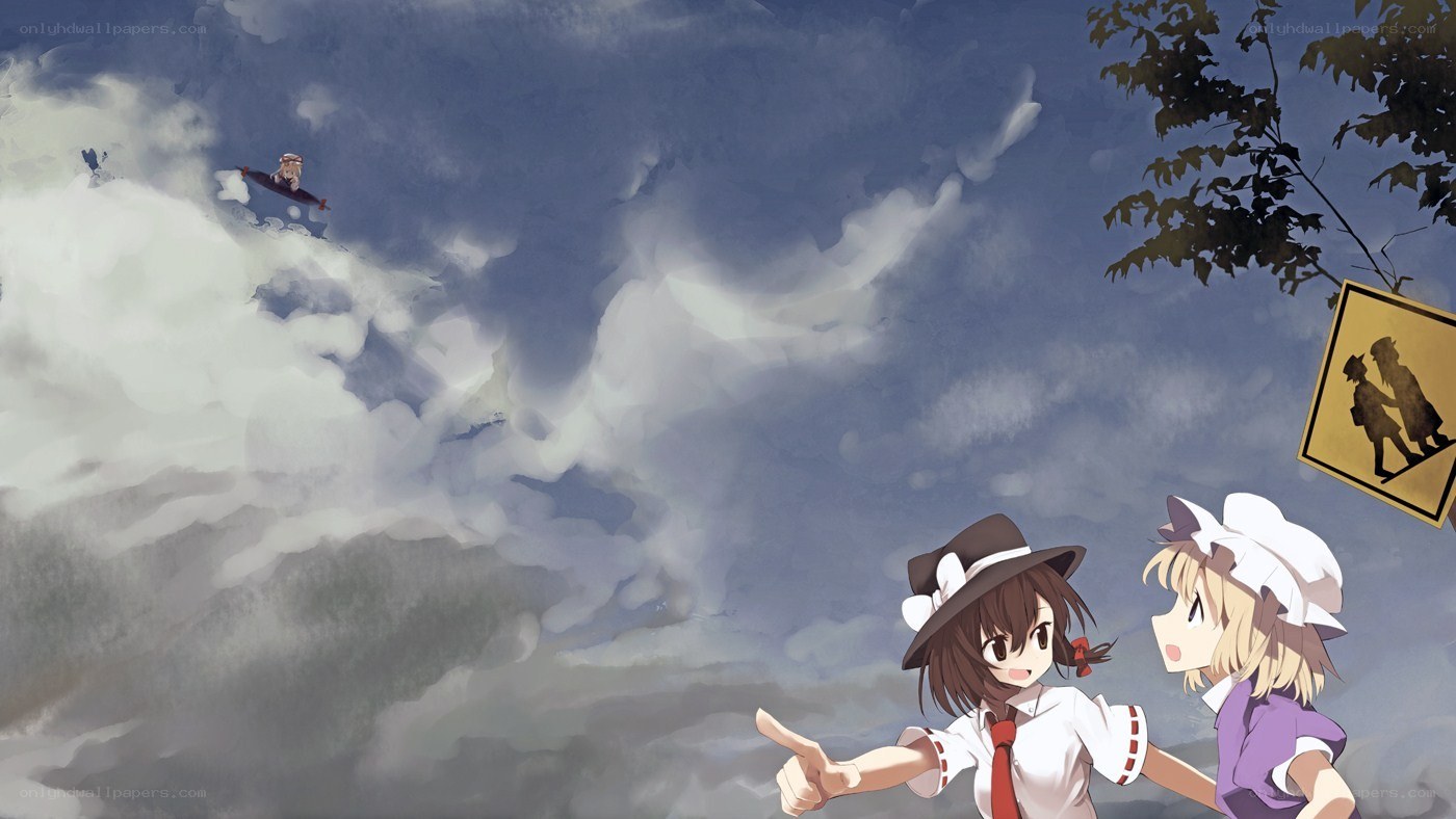 two girls watching a flying object