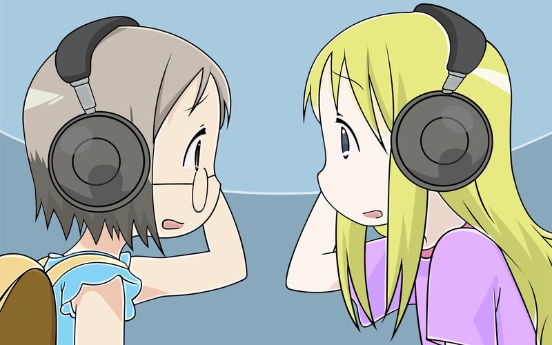 Two Girls Wearing Headphones