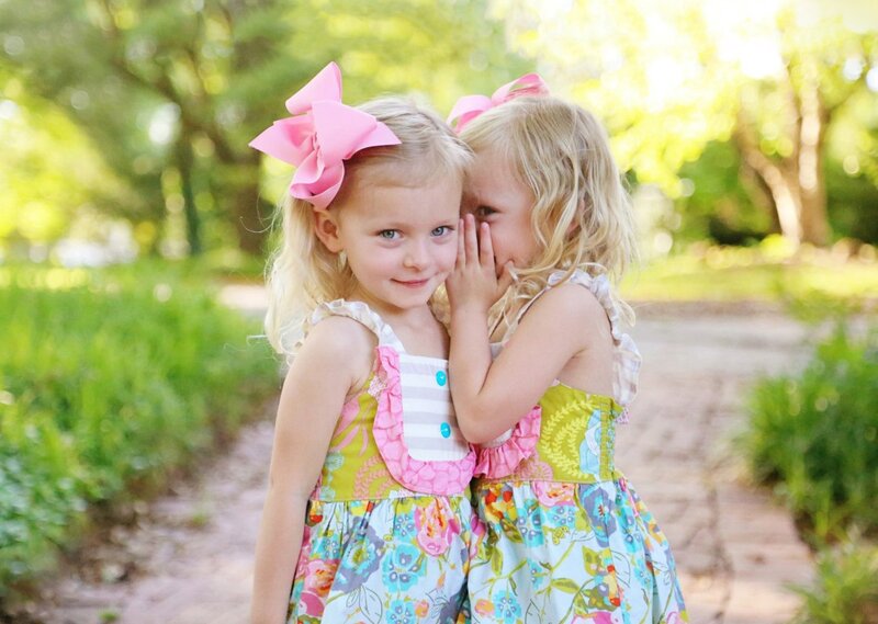 Two Girls Whispering — Green, Playful