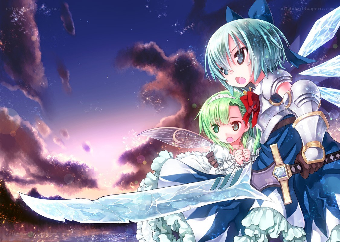 Two girls with a large sword