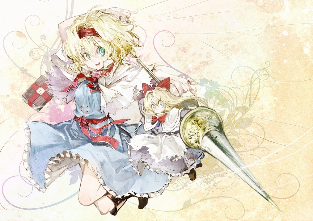 Two girls with a large sword