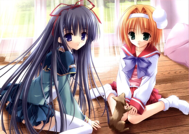 Two girls with a small animal