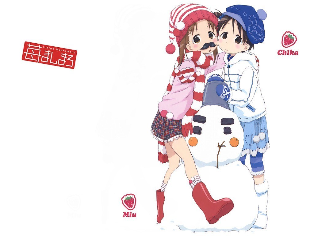 Two girls with a snowman