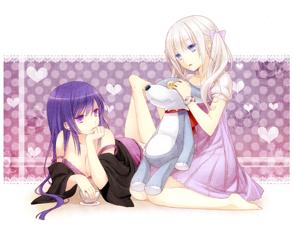 Two girls with a stuffed animal